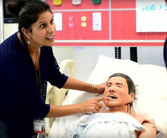 Professor Deepti Vyas in patient simulation lab